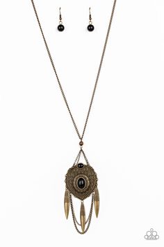 Paparazzi Accessories-Cactus Canyon - Brass Necklace Item #P2TR-BRXX-086XX Earthy black beads are pressed into a stacked brass pendant embossed with ornate circular patterns. Swinging from the bottom of a lengthened brass chain, the colorful pendant gives way to layered brass chains and brass beads radiating with swirling textures for a tribal inspired finish. Features an adjustable clasp closure. Black Medallion With Large Pendant, Black Brass Pendant Necklace, Vintage Black Necklace With Oxidized Finish, Oxidized Metal Medallion Jewelry, Vintage Oxidized Black Jewelry, Black Vintage Oxidized Jewelry, Black Brass Round Pendant Jewelry, Black Engraved Brass Necklaces, Black Brass Medallion Jewelry