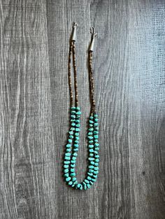 Handmade magnesite turquoise and heishi. 26 inches including clasp. Adjustable Artisan Turquoise Heishi Beads Necklace, Adjustable Artisan Turquoise Necklace With Heishi Beads, Southwestern Beaded Turquoise Heishi Beads Necklace, Handmade Turquoise Heishi Beads Necklace, Southwestern Beaded Turquoise Necklace With Heishi Beads, Southwestern Turquoise Heishi Beads Jewelry, Turquoise And Brown, Heishi Necklace, Beaded Necklaces