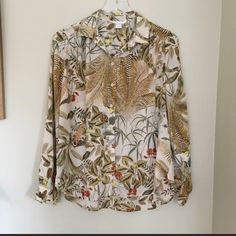 H&M Tropical Long-Sleeved Shirt. Size Small. Pleats On Upper Back And Front. Button Down In Front And At Cuffs. Measurements: Pit-To-Put: 22", Length: 25". Semi-Sheer Polyester Materials. H&m Long Sleeve Floral Print Tops, H&m Floral Print Tops For Fall, Spring Collared Shirt With Tropical Print, Spring Tropical Print Collared Shirt, Patterned Shirt With Tropical Print For Spring, Casual Floral Print Blouse By H&m, H&m Multicolor Tops For Spring, Chic Floral Print Blouse By H&m, H&m Spring Button-up Shirt