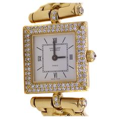 Van Cleef & Arpels 18 Karat gold ladies wristwatch with a quartz movement, square enamel dial with Roman numerals at 12,3,6 and 9. Bordered by a slanted bezel pave set with 2 rows of round brilliant cut diamond and an upside down bezel set diamond in the crown. Each lug is set with a brilliant cut diamond, connected to a polished 18 karat gold flexible bracelet with a deployment hidden buckle. Dial and inside case signed Van Cleef & Arpels, inside case further signed " la collection", 18K 750 and Swiss hallmark. Outside back of case stamped 18K Swiss and numbered 92151. Recently serviced, in working condition. Comes in it's original light green box. Van Cleef Arpels Diamond, Dome Rings, Van Cleef & Arpels, Flexible Bracelet, Van Cleef And Arpels, Bezel Set Diamond, Diamond Rings Bands, Domed Ring, Van Cleef Arpels