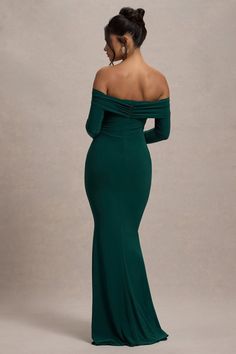 An enchanting style designed for romantic evenings, event season calls for a dress like Amaia. Carefully crafted in a bottle green shade of our sculpting jersey fabric, this maxi is defined by its bardot neckline, subtle cowl detail and long, flattering sleeves. From winter weddings to special prom nights, Amaia is a captivating choice. Features - Premium stretch jersey- Bardot neckline - Draped cowl - Long sleeves- Invisible zip closure- Maxi length Sizing & Fit Model is 5'6 and wears UK size 8 / US size 4 Product Information Designed exclusively by Club L London Double layered with good stretch Premium jersey in Bottle Green (95% Polyester, 5% Elastane) 155cm total length SKU: CL134773047 Bardot Neckline, Emerald Green Dresses, Black Dress Prom, Black Tie Gala, Party Dress Long Sleeve, Winter Weddings, Bridesmaid Outfit, Black Sequin Dress, Bottle Green