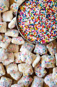 sprinkles and sugar cubes are on the table