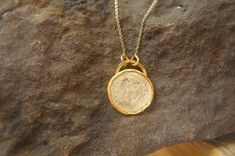 old coin necklace,24k gold pendant, old coin necklace,Ancient Greek Coin, ancient coin jewelry, unique gold pendant, 24k solid gold pendant done with 24k gold, this unique piece will make anyone that wears it happy. i know i like them very much. i am wearing one right now. the chain is made out of 14K gold , about 18 inches (45 cm) . coin is 18 mm diameter 14k gold . solid gold. 24k solid gold is a lifetime jewelry, with just the perfect look . can be worn daily and over night for those who neve Elegant Handmade Coin Necklace, Handmade Elegant Coin Necklace, Ancient Yellow Gold Coin Pendant Jewelry, Ancient Style Brass Necklace With Coin Pendant, Ancient Brass Necklace With Coin Pendant, Ancient Gold Coin Necklace, Ancient Style Yellow Gold Necklace With Coin Pendant, Ancient Style Gold Brass Jewelry, Elegant Handmade Yellow Gold Coin Necklace