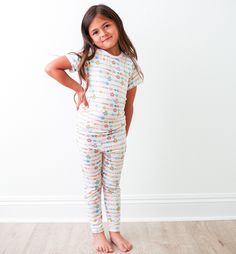 These short sleeve pjs are soft, breathable and super comfy! Made with super soft Bamboo these matching pant and top sets will keep your little one super cozy and snuggly. Short sleeve pajamas for all year lounging. Our pajamas comply with the snug fitting standards for apparel not treated with flame retardants and should be worn snug fitted. 93% Bamboo; 7% Spandex Set includes short sleeve top and pajama pants Wash cold with like colors and fabrics; stays soft wash after wash Tumble dry low or Playful White Loungewear Sets, Playful White Lounge Set, Playful White Lounging Sets, Family Matching Sleep Pajama Sets With Short Sleeves, Family Matching Sleep Sets With Short Sleeves, Casual Super Soft Sleepwear For Bedtime, Playful Relaxed Fit Pajama Party Sets, Playful Relaxed Fit Sets For Pajama Party, Family Matching Loungewear Sets With Short Sleeves