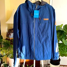 Columbia Men’s Wheeler Peak Jacket-Xl-Nwt Color Blue Columbia Men’s Water And Wind Resistant Full Zip Front Zippered Hand Pockets Velcro Tab Closure Chest Pocket Casual Blue Outerwear For Outdoor, Casual Blue Outdoor Outerwear, Casual Blue Weatherproof Hooded Jacket, Casual Blue Sport Coat For Outdoor Activities, Blue Weatherproof Outerwear For Fall, Weatherproof Blue Outerwear For Fall, Navy Hooded Jacket For Outdoor Fall Activities, Navy Hooded Jacket For Fall Outdoor Activities, Navy Outerwear For Hiking In Fall