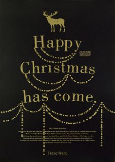 a black and gold christmas card with an image of a reindeer on it's head