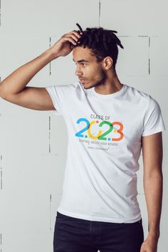 a man with dreadlocks wearing a t - shirt that says class of 2012