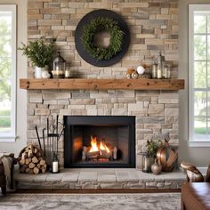 a living room with a fire place and wreath on the fireplace mantel above it