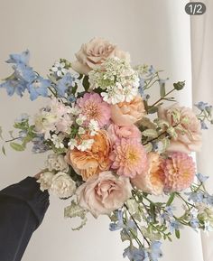 a bouquet of flowers sitting on top of a table