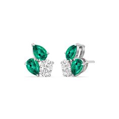 You won't regret treating yourself to this fuss-free wardrobe staple. These diamond and created emerald cluster earrings will easily fit in with many different looks. Each earring features three stones set close to each other: two of which are pear-shaped and set in opposite directions, and one oval-shaped secured by four prongs. Blue Wedding Band, Light Jewelry, Gorgeous Engagement Ring, Diamond Anniversary Rings, Ring Ideas, Emerald Earrings, Emerald Jewelry, Cluster Earrings, Fine Jewelry Gift