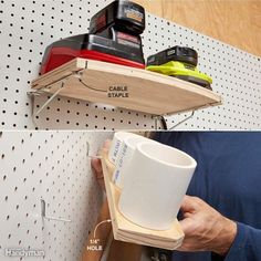 a man is holding a cup in front of a wall mounted shelf with tools on it