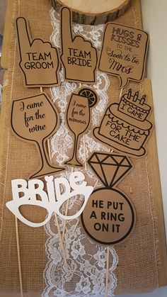 the bride and groom cupcake toppers are made out of burlocked paper