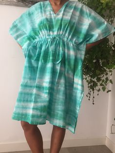 This Item is handmade. We use organic top quality cotton to ensure your skin is pampered and always natural. These are made with light weight fresh cotton fabric so it can dry extremely fast on you beach/pool day and keep you cool. The design is multi functional depending on your mood, Use it like a kaftan to lounge around the house in or even as a swim cover up for your day at the beach or pool. Washing Care: Hand wash for the first wash,Following which a gentle cycle in the machine. Spring Tie Dye Beachwear Kaftan, Casual Hand-dyed Kaftan For The Beach, Tie Dye Flowy Kaftan For Beach Cover-up, Multicolor Batik Print Kaftan For Beach Cover-up, Hand-dyed Tie-dye Kaftan For Beach, Short Kaftan, Coverup Beach, Swim Cover, Dress Gift