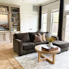 a living room with two couches and a coffee table