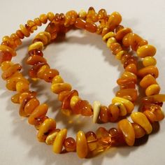 This Is A Vintage, Purchased In Russia, Genuine Baltic Amber Smooth Pebble Nuggets Strand Necklace Measures Approx. 27" Long, 68 G Crew Clasp Good Condition, As Pictured G Necklace, Baltic Amber, Strand Necklace, Orange Yellow, Womens Jewelry Necklace, Beading, Amber, Russia, Jewelry Necklaces