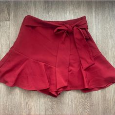 Brand New Zara Tie Front Flounce Skort. Tags Removed But Never Worn. Size Small. Tie Is Adjustable, Zipper On The Side, Built In Short. Casual Red Bottoms For Date Night, Red Non-stretch Bottoms For Day Out, Non-stretch Red Bottoms For Day Out, Asymmetrical Skort, Zara Skort, Zara Tweed, Black Skort, Zara Mini, Zara Shorts