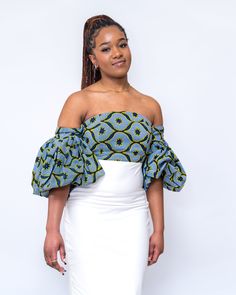 A blend of African print with plane stretchy fabric, into a chic party dress. Finely fitted tube top with puffy sleeve and fitted skirt part, which expands to fit various hip shape., The elegance speaks for itself   from that red carpet event  to girls night outing and to that party which calls for uniqueness. Chic Party Dress, Formal Skirts, Night Outing, African Print Tops, Formal Skirt, Chic Party, Red Carpet Event, Tube Dress, Fitted Skirt