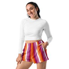 Add these cute lesbian shorts to your pride wardrobe. These lesbian sunset flag stripe shorts are a great way to show off your gay pride and not only are they super cool for pride events and festivals, they are functional athletic shorts made for swimming, running and other sporting activities and you'll won't want to be without them when heading to the beach or lounging by the pool. You'll also appreciate the mesh pockets large enough to hold your phone. DETAILSComfortable elastic waistband wit White Pajama Shorts For Summer Sports, White Surfing Shorts, White Pajama Shorts For Poolside, Multicolor Athleisure Shorts For Summer, Multicolor Sporty Surfing Shorts, Multicolor Sporty Shorts For Surfing, Sporty Multicolor Surfing Shorts, Multicolor Athletic Shorts For Summer Workout, Sporty Multicolor Short Swimwear