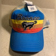 Licensed Ford Bronco Retro Style Trucker Netted Snapback Hat Nwt Casual Blue Hats For Rodeo, Trendy Blue Hat For Rodeo, Country Style Blue Hat, Blue Country Style Hat, Retro Blue Hat For Spring, Blue Adjustable Trucker Hat For Rodeo, Adjustable Blue Trucker Hat For Rodeo, Blue Cap For Rodeo, Retro Wide Brim Blue Hat