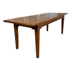 a wooden table sitting on top of a white background