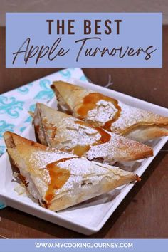 apple turnovers on a plate with powdered sugar and caramel drizzle