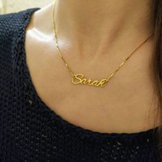 18k Gold Plated - Custom Made Necklace - Gold Nameplate Chain - Name Pendant - Cursive Font - Sarah . . . . . . . . . . . . . . . . . . . . . . . . . . . . . . . . . . . . . . . . . . . . . . . . . . . . . . . . .  Looking for a thoughtful gift for your loved one?  You will love this high quality 18k gold plated Custom made Necklace.  This is a perfect gift for your girlfriend or wife.  Personalize it with her name in a beautiful font. This lovely 18k gold plated custom made Nameplate Chain is m Gold Name Necklace With Round Pendant For Anniversary, Elegant Name Pendant Chain Necklace, Gold Nameplate Necklace For Everyday, Yellow Gold Round Pendant Necklace With Name, Elegant Pendant Chain Necklace With Name, Gold Engraved Pendant Chain Necklace, Gold Plated Engraved Chain Necklace, Gold-plated Engraved Chain Necklace, Engraved Gold Plated Chain Necklace