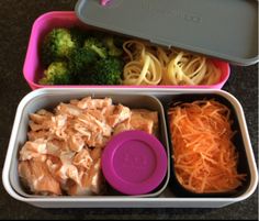 the lunch box is filled with different types of food