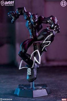 an action figure is posed on a stand