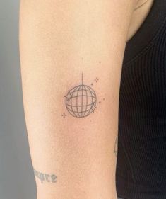 a woman's arm with a tattoo on it that reads future and has a globe in the middle