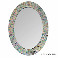 a round mirror with multicolored tiles on the bottom and sides, is shown