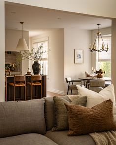 a living room filled with lots of furniture