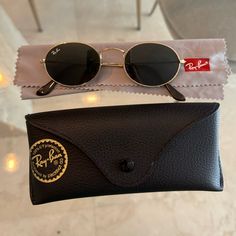 Rayban Oval Sunglasses With Gold Rim. Gently And Barely Used, Like New. Rayban Oval Sunglasses, Rayban Sunglasses For Women, Oval Glasses, Beautiful Pakistani Dresses, 2025 Vision, Oval Sunglasses, Sunglasses For Women, Ray Ban Sunglasses, Colored Sunglasses