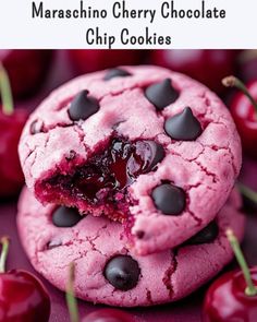 two cookies with chocolate chips and cherries on top