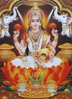 the hindu goddess sitting on top of a lotus