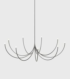 a modern chandelier with five lights hanging from it's center and four arms