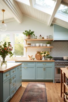 a kitchen filled with lots of counter space next to a stove top oven and sink