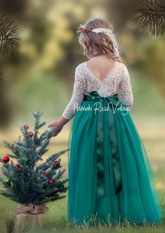 Green Flower Girl Dress with sleeves - Hannahrosevintageboutique.com Christmas Flower Girl Dresses, Velvet Flower Girl Dresses, Flower Girl Dresses Green, Christmas Wedding Flower Girl, Winter Wedding Flower Girl, Flower Girl Dress With Sleeves, Green Flower Girl Dress, Feathered Fringe, Green Tulle Skirt