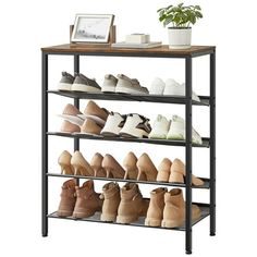 the shoe rack has many pairs of shoes on it