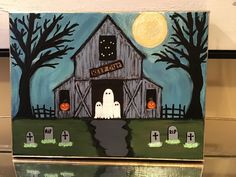 a painting of a barn with ghost and pumpkins on the front, painted in acrylic paint