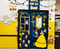 a door decorated to look like the beauty and the beast