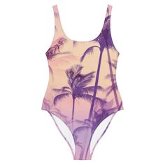 Get that tropical vibe with this one piece swimsuit! Soft fabric, flattering design, & cheeky cut. • 82% Polyester, 18% Spandex• Fabric weight: 6.78 oz/yd² (230 g/m²), weight may vary by 5%• Chlorine-resistant fabric• Cheeky fit with a scoop neckline and a low scoop back• Zig-zag stitching• Double-layer front • Four-way stretch material stretches and recovers on the cross and lengthwise grains Size guide CHEST (inches) WAIST (inches) HIPS (inches) XS 33 ⅛ 25 ¼ 35 ⅜ S 34 ⅝ 26 ¾ 37 M 36 ¼ 28 ⅜ 38 Summer Swimwear With Palm Tree Print For Swimming, Tropical Printed Bodysuit For Swimming, Poolside Tropical Print One-piece Bodysuit, Fitted Palm Tree Print Swimwear For Beach Season, Fitted Palm Tree Print Swimwear For Beach Party, Palm Tree Print Swimwear For Beach Season, Tropical Printed Bodysuit For Beach Party, Tropical Print Tropical Style Bodysuit For Pool, Tropical Print Bodysuit For Pool