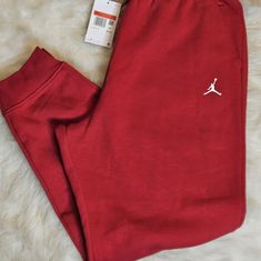 Brand New, Never Worn, With Tags, Nike Jordan Essentials Fleece Pant Casual Red Joggers For Fall, Red Fleece Athleisure Sweatpants, Red Cotton Sportswear Sweatpants, Winter Casual Red Joggers, Sporty Red Sweatpants For Winter, Red Winter Sports Joggers, Red Sweatpants With Pockets For Fall, Red Sweatpants For Winter Loungewear, Red Athleisure Bottoms For Fall