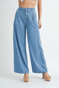 Fall for the silhouette of these high-waist jeans crafted in a light wash and punctuated with retro-inspired wide hems. • Button/Belt Loops• Wide Leg• Pleated Detail Wide Leg Washed Blue Flare Jeans With Belt Loops, Chic Washed Blue Wide Leg Flare Jeans, Chic Washed Blue Wide Leg Jeans, Mid-rise Denim Wide Leg Pants With Belt Loops, Chic Wide Leg Washed Blue Jeans, Chic Light Wash Denim Flare Jeans, Chic Relaxed Fit Light Wash Flare Jeans, Chic Light Wash Relaxed Fit Flare Jeans, Trendy Medium Wash Wide Leg Pants For Work