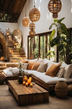 a living room filled with lots of furniture and candles