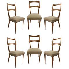 six mid century style dining chairs with upholstered backrests