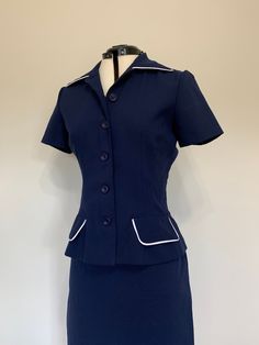 "Awesome vintage two piece top and skirt set in navy blue with white trim. Both pieces in excellent clean, like new, condition. Top has button down closure down front with short sleeves. Skirt is high waisted and shorter in length. Measurements (taken zipped or buttoned up and laid comfortably flat) x 2 for total circumference (inches) La Belle Made in USA *Top* Tag Size 7 Shoulder 15.5\"(seam to seam) Shoulder circumference up to 37\" Bust 36\" Waist 28\" Total Length 22\" Sleeve 7\" Top sleeve 80s Two Piece Outfit, Navy Blue Skirt Set, Retro Fitted Blue Sets, Blue Fitted Two-piece Set, 60s 2 Piece Set, Two Piece Outfits Skirt, Levis Jeans High Waisted, Levis Mom Jeans, High Waisted Jeans Vintage