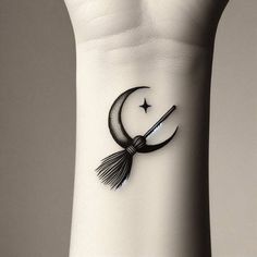 a tattoo on the wrist of a person with a tatoo and an arrow