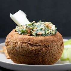 a close up of a bowl of food on a plate