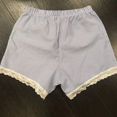 Seersucker And Lace Pajama Shorts. Size Small. Super Cute, Never Worn. Striped Pajama Shorts For Summer Pajama Party, Striped Summer Bottoms For Daywear, Summer Seersucker Bottoms With Elastic Waistband, Spring Seersucker Bottoms With Elastic Waistband, Seersucker Shorts For Vacation, Summer Seersucker Bottoms For Vacation, Striped Bottoms For Summer Pajama Party, Summer Blue Bloomers With Elastic Waistband, Seersucker Bottoms For Summer