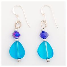 the earrings are made from glass and silver